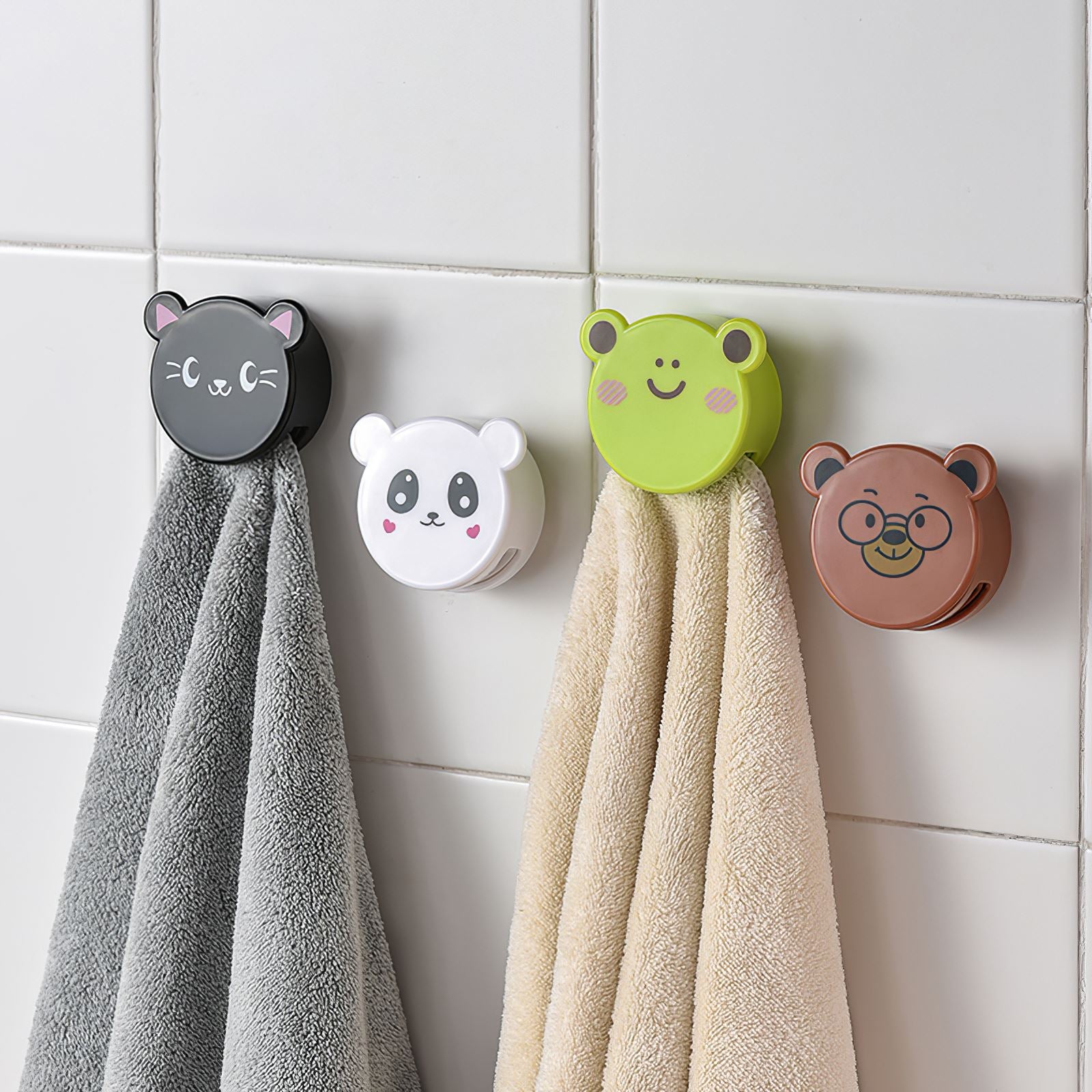 Towel holder with cartoon characters